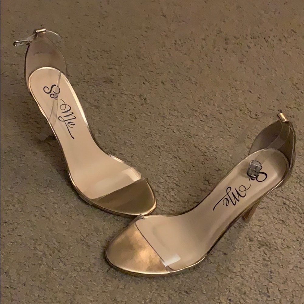 Clear and gold heels